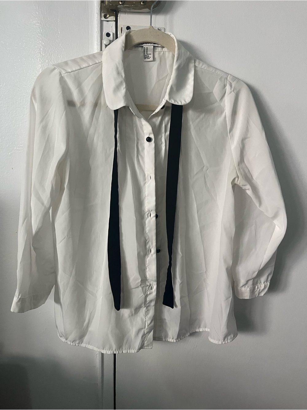 Forever 21 white button-up blouse with black ribbon detail, size M